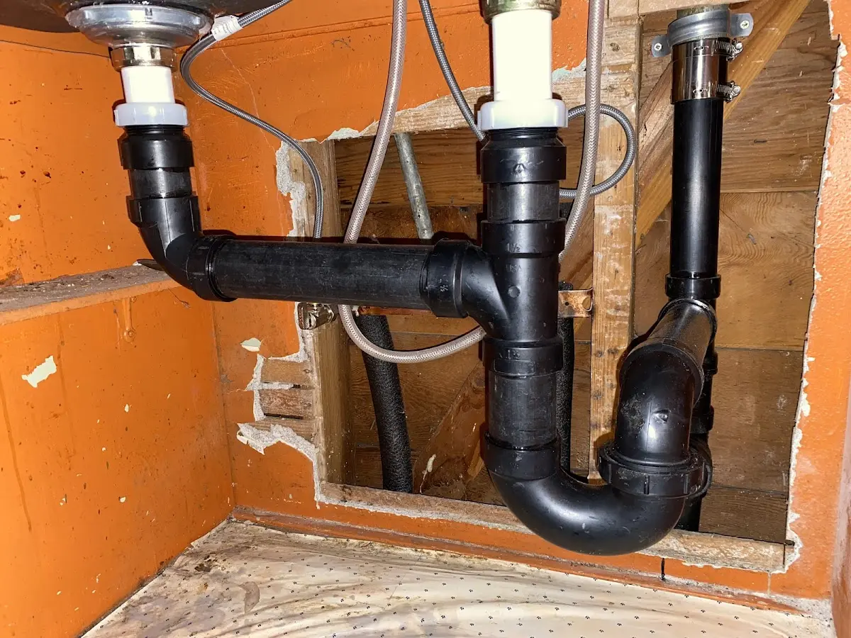 Professional Garbage Disposal Repair equipment and tools on the job in Blair